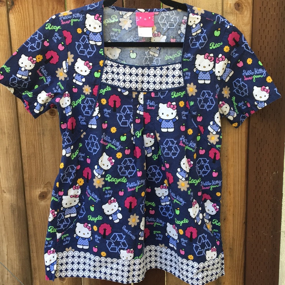 Sold! Hello Kitty Scrub top medium recycle, trees